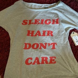 A Christmas themed long sleeve grey shirt